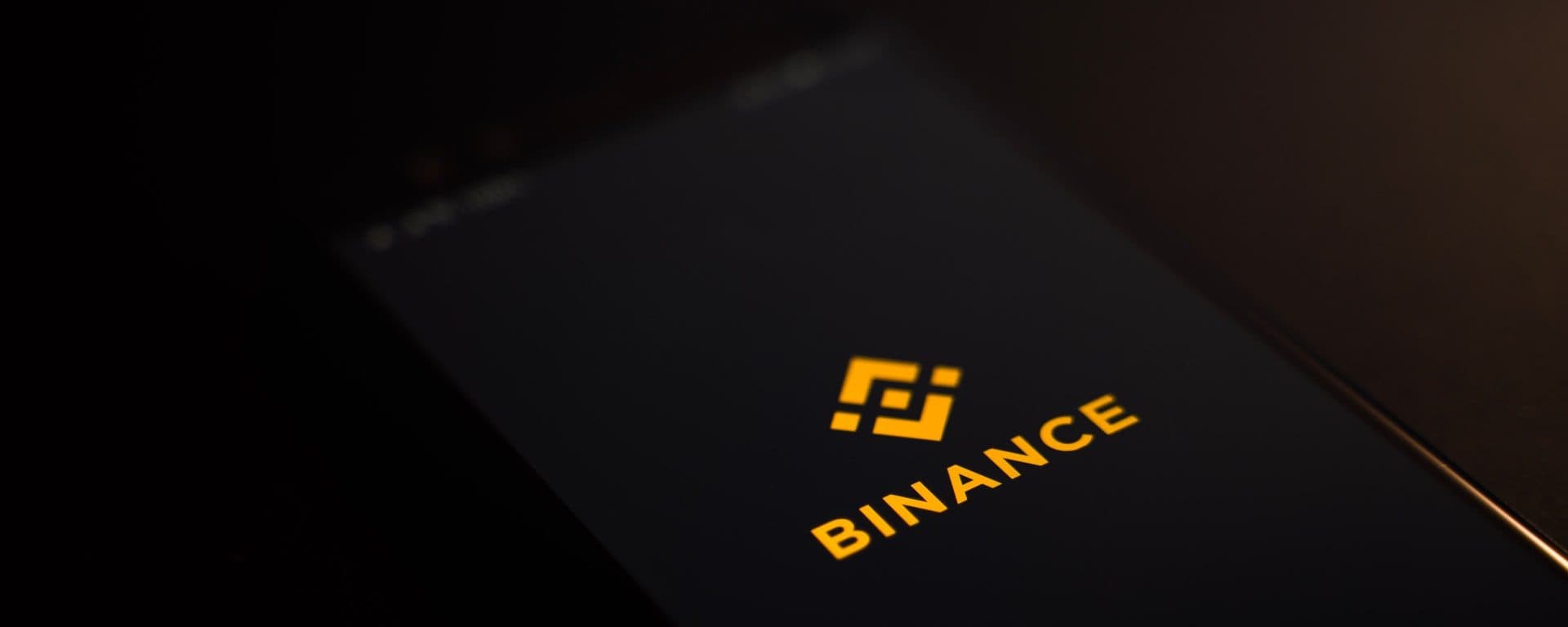 Binance logo displayed on a smartphone screen