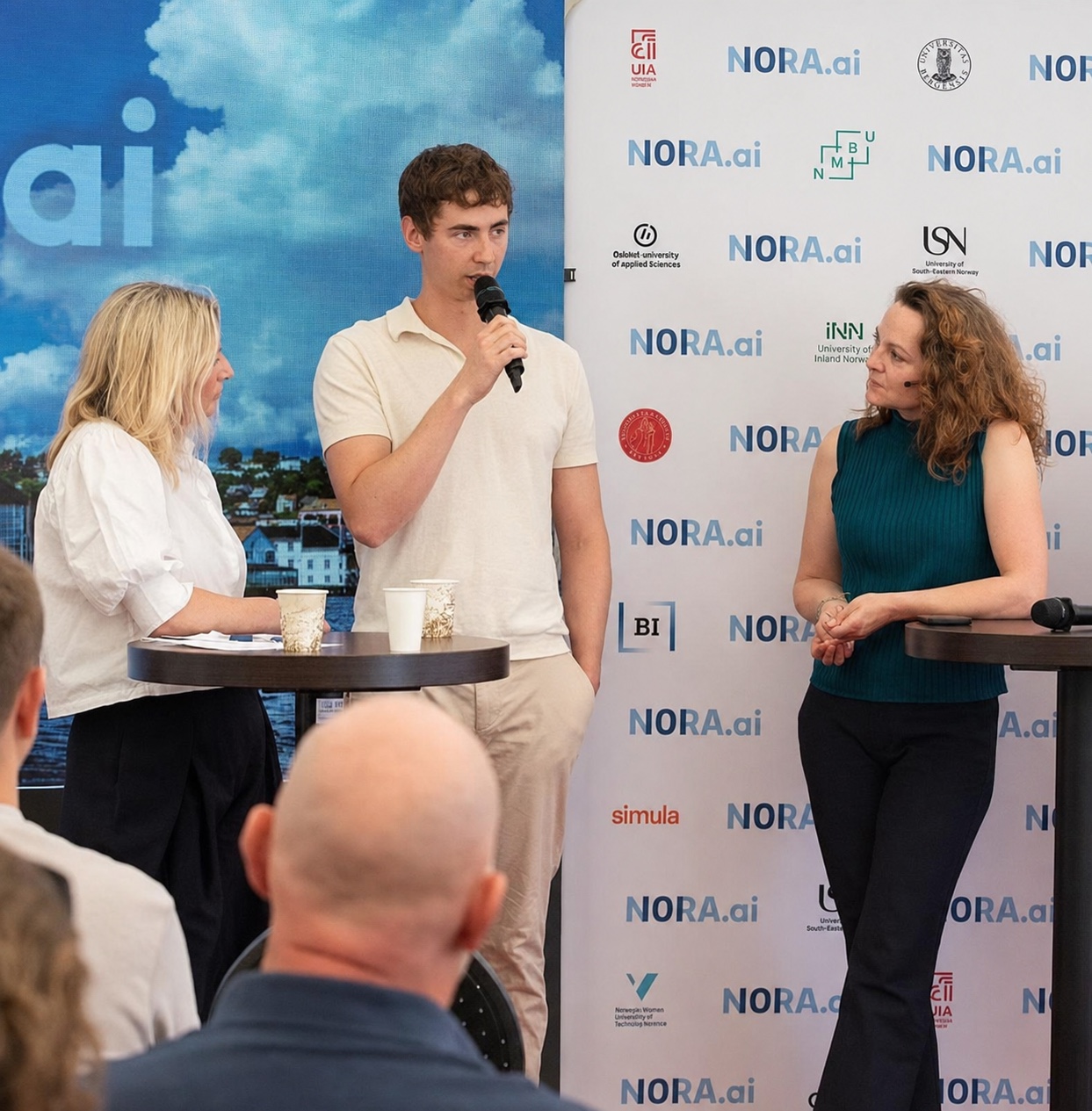 Oskar Solberg speaking at an AI conference